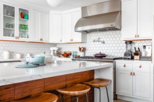 Layering hard finishes in a kitchen staging design