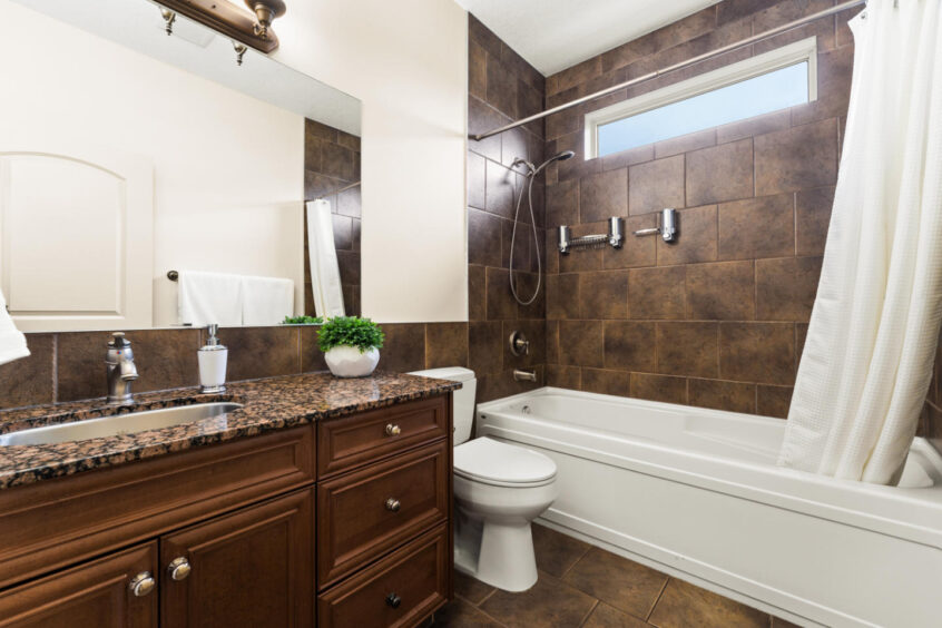 Occupied home staging in Stony Plain bathroom by MacPhee Interiors