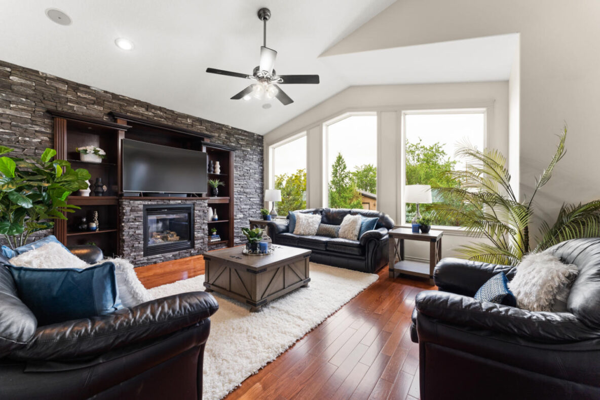 Occupied home staging in Stony Plain living room by MacPhee Interiors