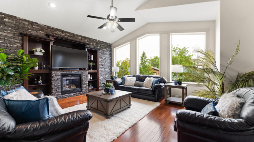 Occupied home staging in Stony Plain living room by MacPhee Interiors