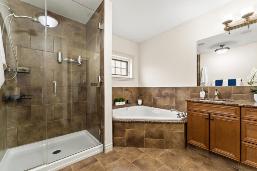 Occupied home staging in Stony Plain master bathroom by MacPhee Interiors