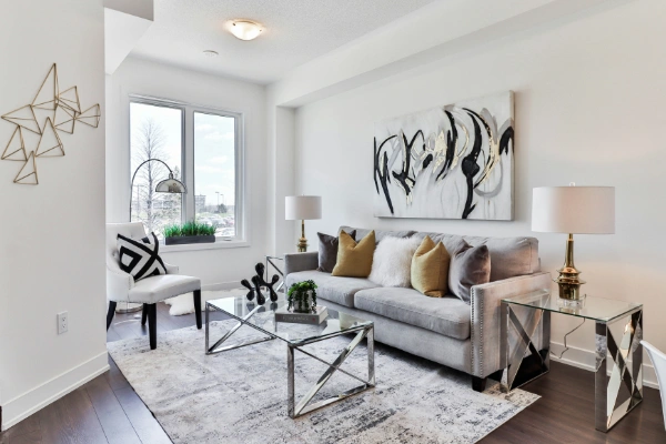 Bright white livingroom with silver and gold accents